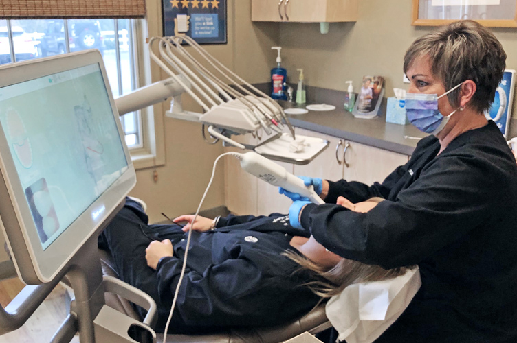 dr and patient with itero scanner scanning