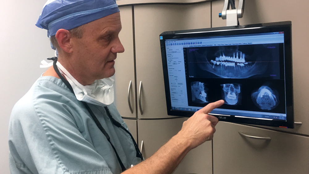 Dr. Resnik demonstrates use of barrier membranes