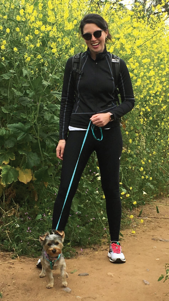 Dr. Manalili hiking with her dog during California’s wildflower super bloom in the spring of 2019.