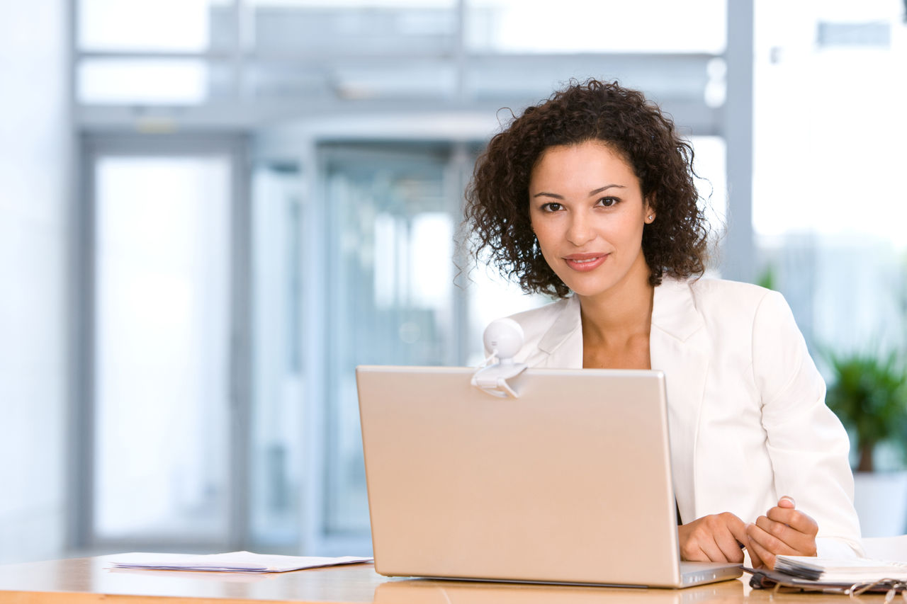 Woman working with Laptop Computer
