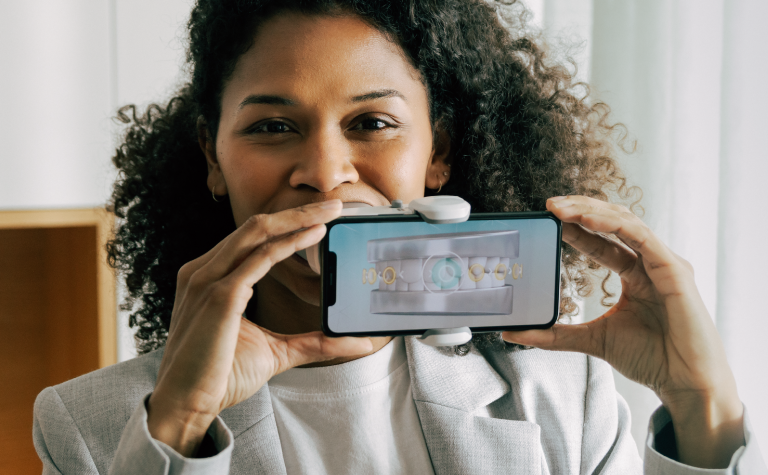 Woman using the ScanBox Pro with phone Woman using the ScanBox Pro with phone